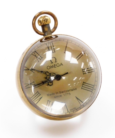 An Omega marked desk ball clock, with two rock crystal sides, on Omega silvered dial, with a seven jewel movement, bezel wind with black hands, 8cm high.