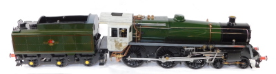 A scratch built 5" gauge British Railways Standard Class 5MT locomotive, 4-6-0, and tender, green livery, No 73173, with bespoke carry cases, 36cm high, 180cm wide, 23cm deep.