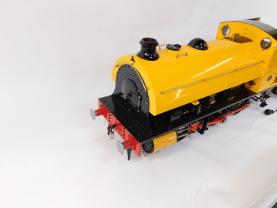 A scratch built Hawthorn Leslie tank locomotive ALF 0-6-0ST, and ride on tender, yellow livery, No 16, with bespoke carry case for engine, 35cm high, 155cm wide, 24cm deep, tank locomotive 84cm long. - 2