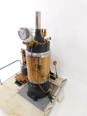 A scratch built steam vertical boiler, 80psi, model no 120964, on a bespoke base with carrying handles, 67cm high. - 2