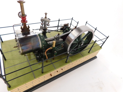 A Stuart Turner No 9 steam engine, scratch built, on a naturalistic fenced and bricked rectangular base, model 28cm wide. - 3