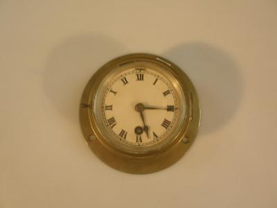 A George VI world war II brass ship's bulk head clock