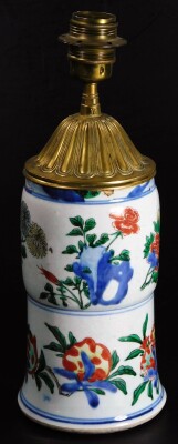 A Chinese porcelain transitional wucai vase, decorated with bands of pomegranates and chrysanthemums, the upper part missing, 17thC, with later mounts converted to a lamp, 39cm high. (AF)