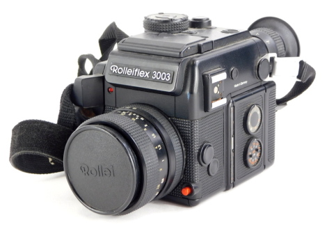 A Rolleiflex 3003 SLR camera, with Zeiss Planar f1.8 50mm lens.