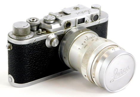 A 1947 Leotax Special DII camera, an exact Japanese copy of a Leica II, serial number 12648, the camera fitted with a Steinheil Munchen 8.5cm f2.8 Culminar lens, the body of the camera engraved 'Mioj,' signifying that the camera was made in occupied Japan