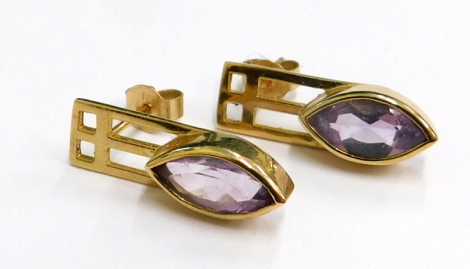 A pair of amethyst drop earrings, each with an amethyst drop, above a pierced top section, on a single stemmed butterfly back, yellow metal, stamped 9k, 2.6g.