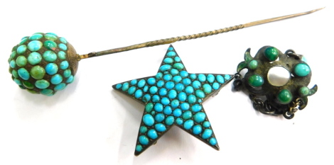 A turquoise set stick pin, a silver enamelled turquoise and a mother of pearl set pendant, and a turquoise set star brooch, in silver gilt backing. (3)