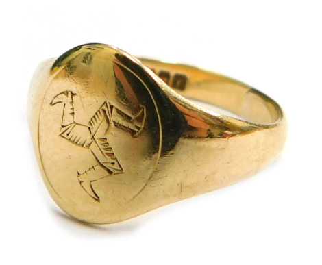 A 9ct gold signet ring, bearing the Isle of Man symbol, with maker's stamp LW Birmingham 1948, ring size L, 2.1g, boxed.