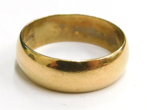 A 9ct gold wedding band, of plain design, London, ring size P½, 3.9g.