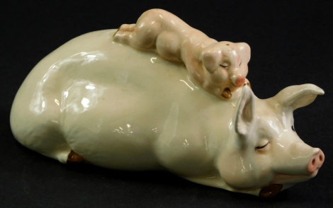 A Beswick model of a pig with a piglet on its back, 17cm long.