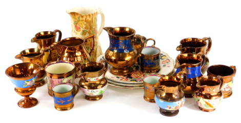 A collection of Victorian and later copper lustre jugs, mugs and pedestal goblets.