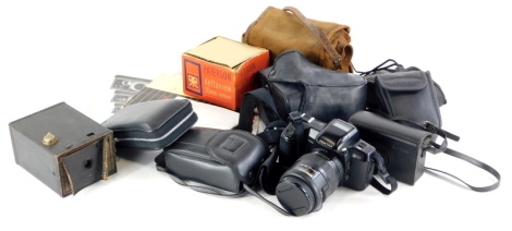 A quantity of cameras, to include box cameras, Canon, Pentax, a Pentax Z10, etc.