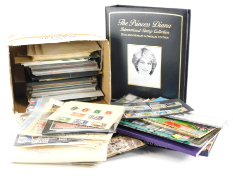 A large quantity of first day covers, some stamp albums, etc.