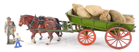 A Britains diecast millers dray and two horses, a farmer with articulated arm, etc.