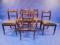 A set of four Regency mahogany dining chairs with pierced ring bar backs