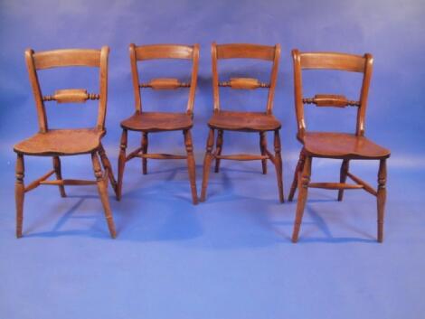 A set of four 19thC mahogany bar back Windsor side chairs with the makers