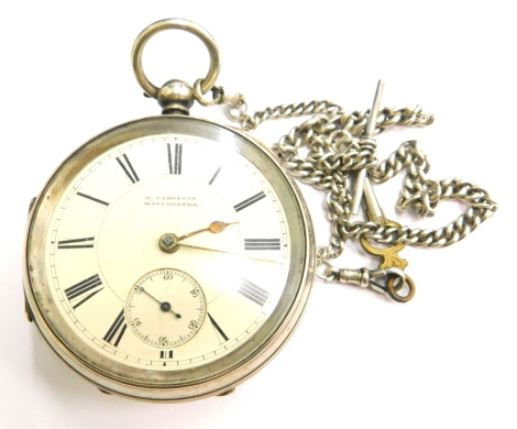 A late Victorian silver cased pocket watch, the enamel dial signed G. Aaronsson, Manchester, Birmingham 1894, and a silver chain.