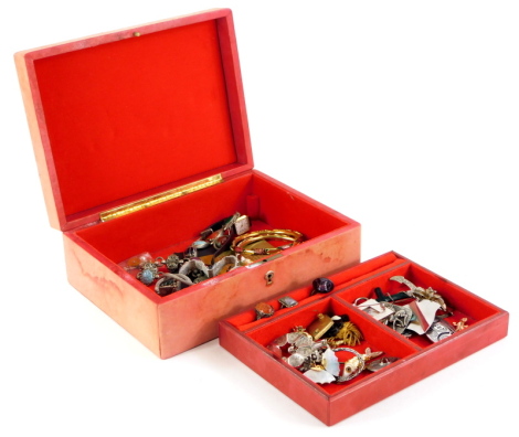 A red leather jewellery box and contents, comprising stone set jewellery, cloisonne type bangles, silver plated animal brooches, filigree brooch, butterfly wing ring, various other brooches, etc. (1 box)