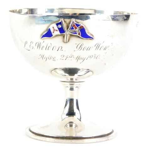 A George V silver goblet shaped trophy cup, applied with enamel flags, initialled L E Weldon, Bow Wow Hythe 24th May 1930, presumably a yachting trophy, London 1930, 4½oz.