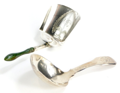 Two silver caddy spoons, to include a shovel shaped example with green stained and turned ivory handle, Birmingham 1802, and another of plain form, possibly London 1806.