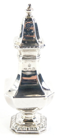 A George V silver pepper pot, of canted square form with gadrooned border tot he foot, London 1917, 1½oz.