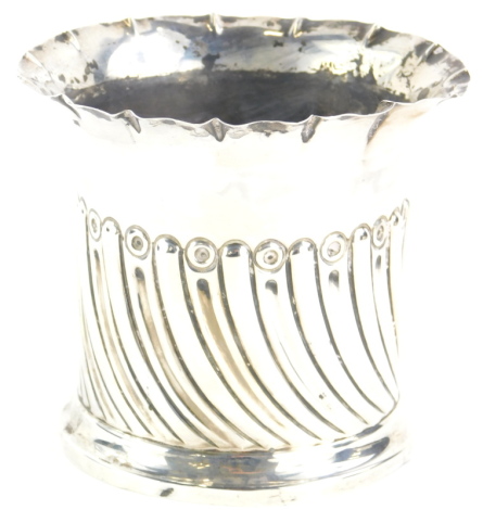 A small cylindrical vase or bottle holder, with part fluted decoration and tapering foot, Sheffield 1895, 4¾oz, 10cm high.