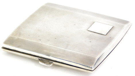 A George V silver engine turned cigarette box, of plain form with vacant square cartouche, Birmingham 1935, 3¼oz.