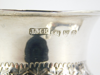 A Victorian small silver thistle shaped salt and spoon, the salt Chester 1898, 1oz overall. - 2