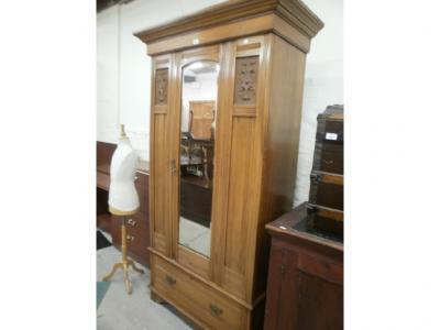 A Victorian satin walnut single wardrobe