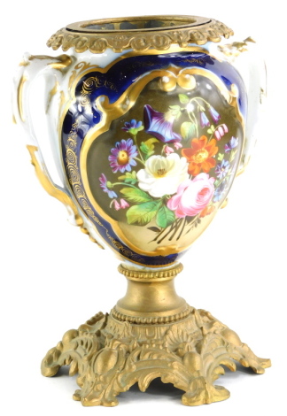 A 19thC Paris porcelain oil lamp base, with gilt metal mount, painted with flowers, within a gilt cartouche with cobalt blue border, 31cm high. (AF)