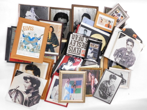 A large quantity of Elvis Presley related prints, mirrors, mirrored pictures, etc.