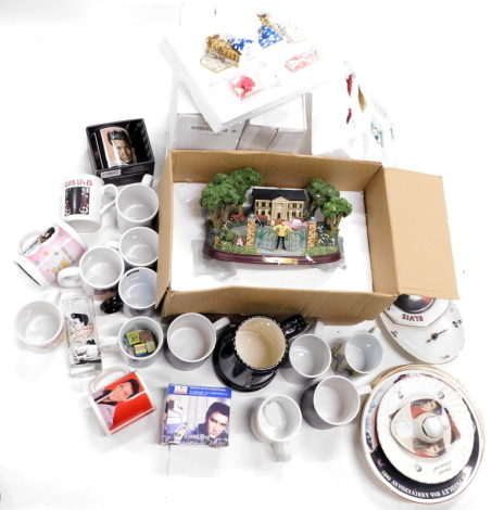 A quantity of Elvis Presley souvenir items, to include a quantity of mugs of various designs, Christmas decorations, etc.