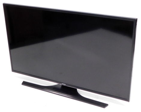 A Samsung 40" Smart TV, with remote.