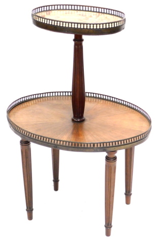 A late 19th/ early 20thC French two tier etagere, the oval galleried top inset with breche d' allep marble, on a turned and fluted column, the larger galleried tier with radiating veneers, on turned and fluted legs, 77cm high, 51cm wide.