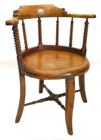 A 19thC ash and elm captains type chair, with bobbin turned support, solid feet and splayed legs. Note: VAT is payable on the hammer price of this lot at 20%.