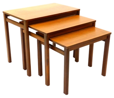 A nest of three G Plan type rectangular tables, each on square section legs, 61cm wide.