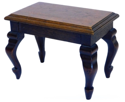 A late 19th/ early 20thC small rectangular oak stool, on cabriole legs, the top 22.5cm wide.