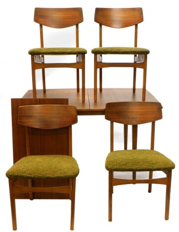 A 1960s/70s retro teak rectangular extending dining table, the top 82cm x 119cm, and four chairs. The upholstery in this lot does not comply with the 1988 (Fire & Fire Furnishing) Regulations, unless sold to a known exporter or upholsterer it will be cut 