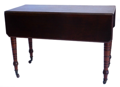 A Victorian walnut Pembroke table, the rectangular top with canted corners and a moulded edge, above a frieze drawer on turned tapering legs, 105cm wide,