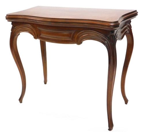 A 19thC French mahogany card table, the serpentine shaped top with a moulded edge above a scroll carved frieze on cabriole legs, 83cm wide.