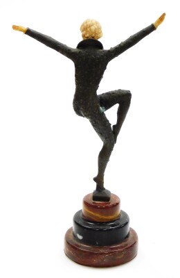 After Demetre Chiparus (1886-1947). Dancing female, an Art Deco bronze figure based on The Dancer of Kapurthala, with ivorine hands, head and body insert, signed D H Chiparus, and raised on a three layer circular onyx plinth, 31cm high. - 3