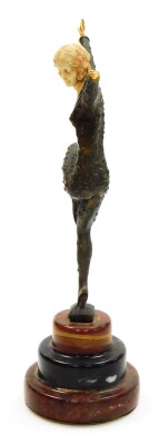 After Demetre Chiparus (1886-1947). Dancing female, an Art Deco bronze figure based on The Dancer of Kapurthala, with ivorine hands, head and body insert, signed D H Chiparus, and raised on a three layer circular onyx plinth, 31cm high. - 4