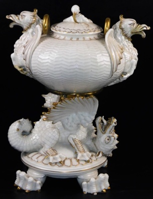 A second period Belleek Dragon tea kettle, cover and stand, second period black mark, 1891-1926, decorated with the highlights, picked out in gold, 35cm high. (3) For an example of a similar dragon tea kettle on stand see Irish Porcelain page 107. - 4