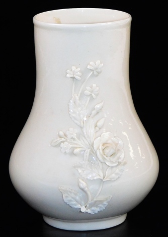 An unusual tall Belleek Allingham vase, second green mark and registration mark for the US of A, the ogee shaped vase applied with rose and shamrock, 18cm high.