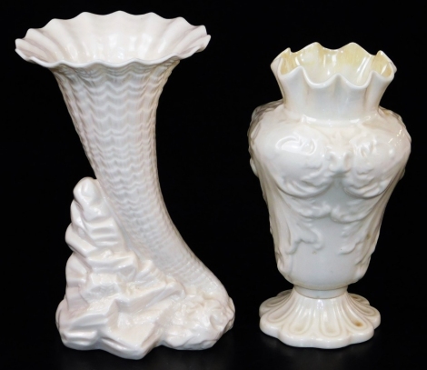 A tall Belleek Rathmore vase, of moulded form; together with a mid rock spell vase, the trumpet cornucopia sitting on a rock, both marked second green mark and both 18cm high. (2)