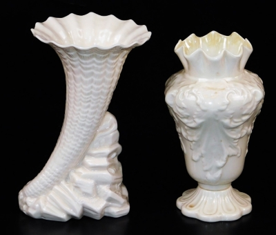 A tall Belleek Rathmore vase, of moulded form; together with a mid rock spell vase, the trumpet cornucopia sitting on a rock, both marked second green mark and both 18cm high. (2) - 2