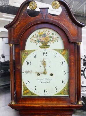 Joseph Wilson of Stamford. A Georgian grandmother long case clock, the break arch dial painted with flowers and fruit, dial bearing Arabic numerals, subsidiary seconds dial, two train eight day movement, with bell strike, the hood with a break arch pedime - 3