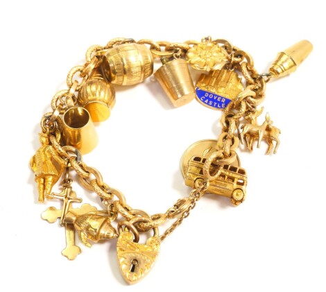 A 9ct gold charm bracelet, with thirteen charms as fitted, on a heart shaped padlock clasp, with safety chain as fitted, 33.6g.