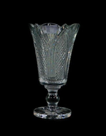 A Waterford Crystal vase, raised on a single knop stem, and star cut circular base, 25cm high.