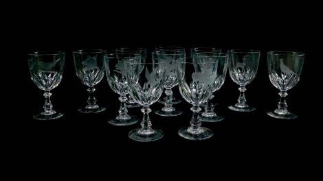 A set of twelve Caithness glass wine glasses, engraved with game birds, wild and domestic animals.